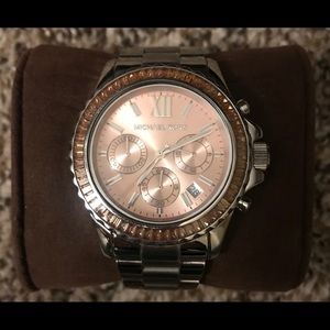 Michael Kors silver watch with pink crystals.